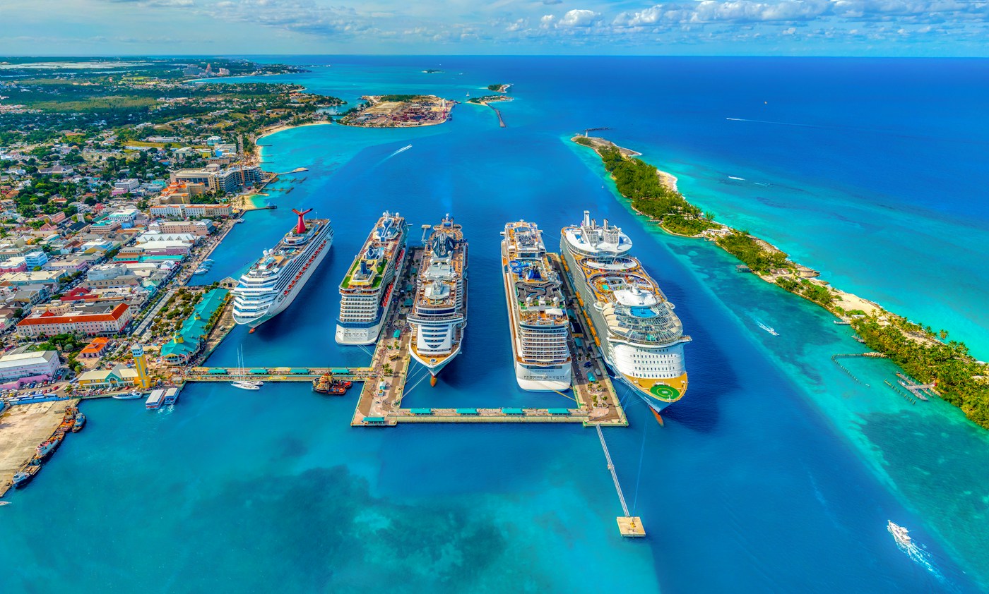 Cruise ships docked in brilliant turquoise Caribbean water